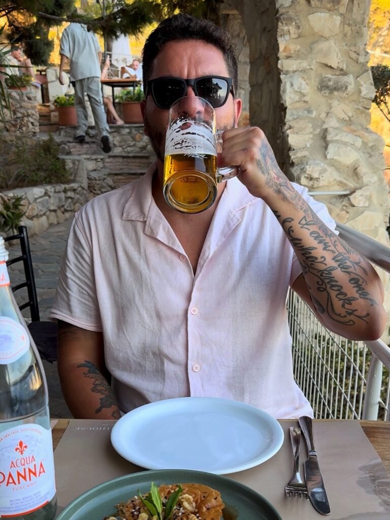 rod drinking beer keri lighthouse restaurant zakynthos greece
